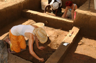 Students digging in archeology program