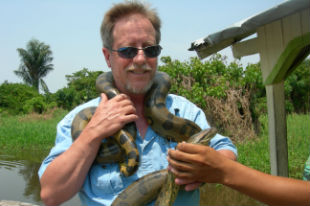Jonathan Hill with Amazon snake